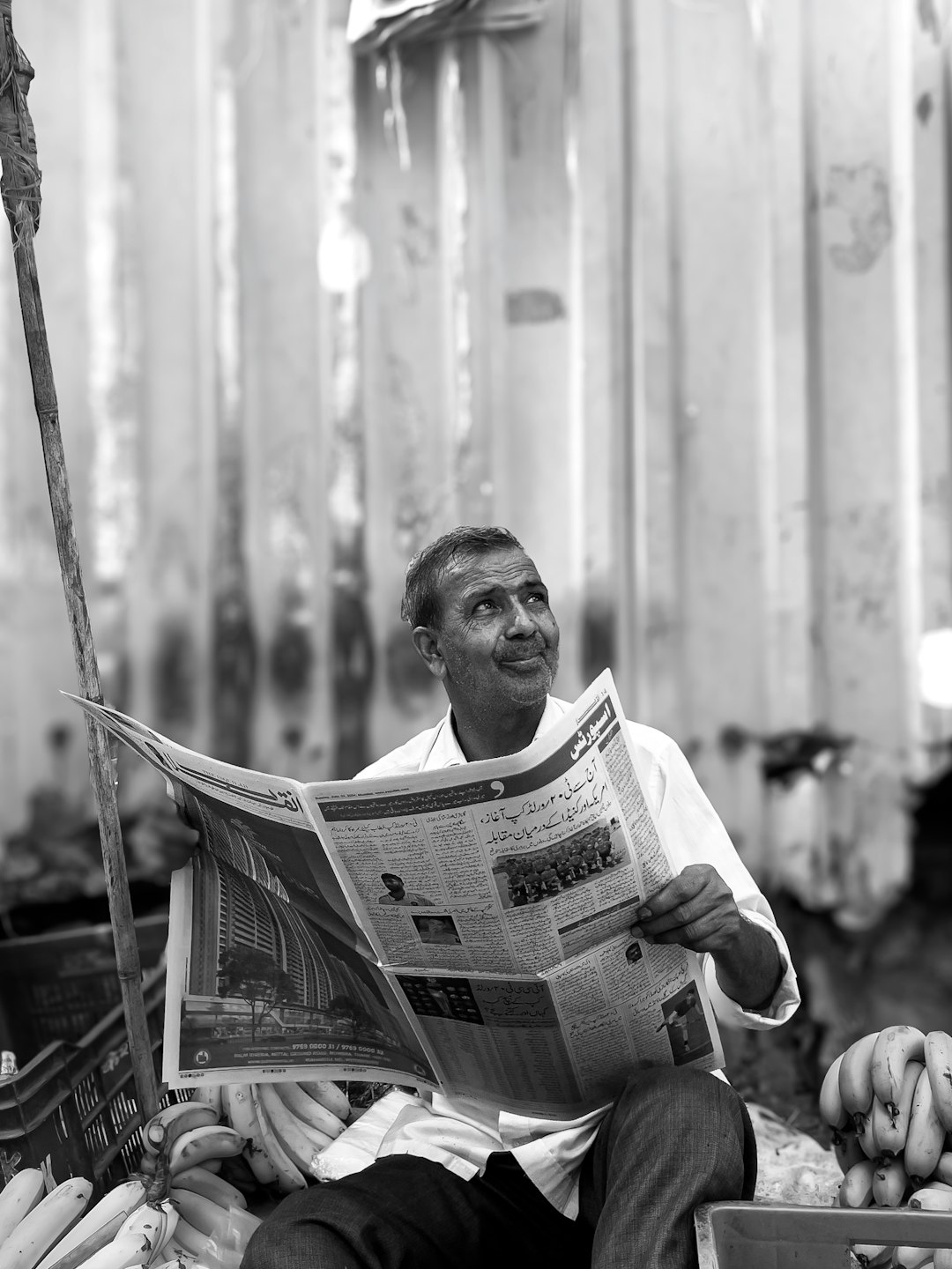 Worker Reading Newspapers